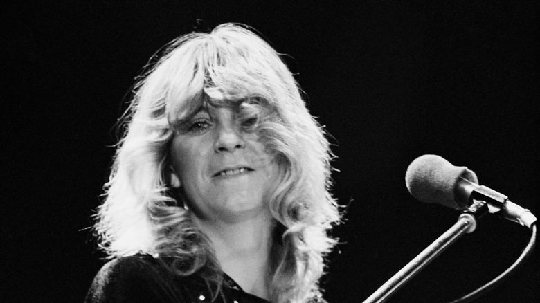 Christine McVie singing on stage