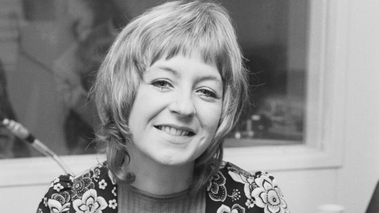 Young Christine McVie smiling