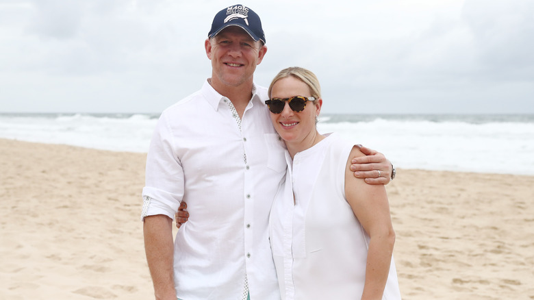 Zara and Mike Tindall on a beach