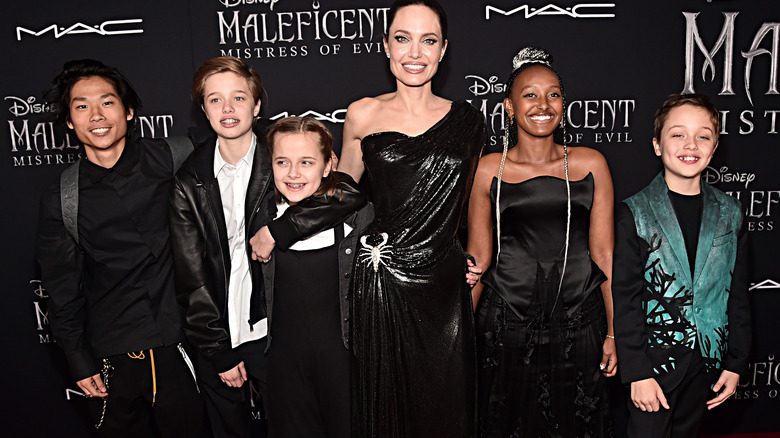 Angelina Jolie smiling with her children