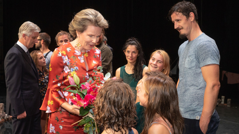 Queen Mathilde attends a performance