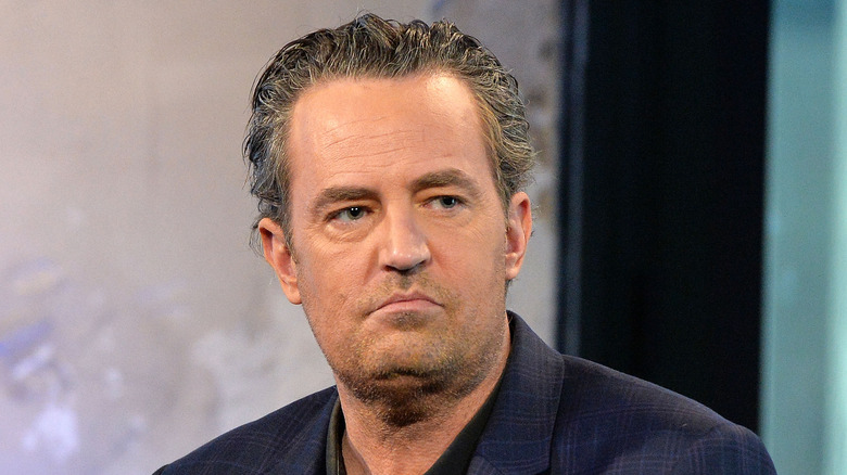 Matthew Perry at a press event 