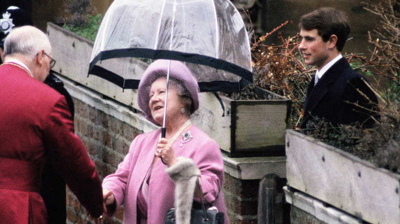 Edward follows the Queen Mother