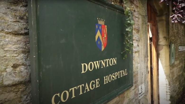 A closeup of the sign for Downton Cottage Hospital