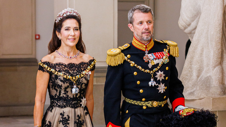 Queen Mary and Frederik in full royal regalia at Christiansborg palace