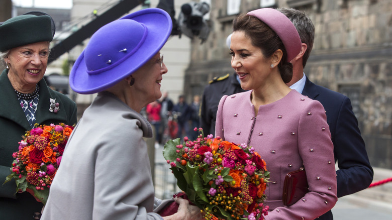 Queen Margrethe and Mary smiling