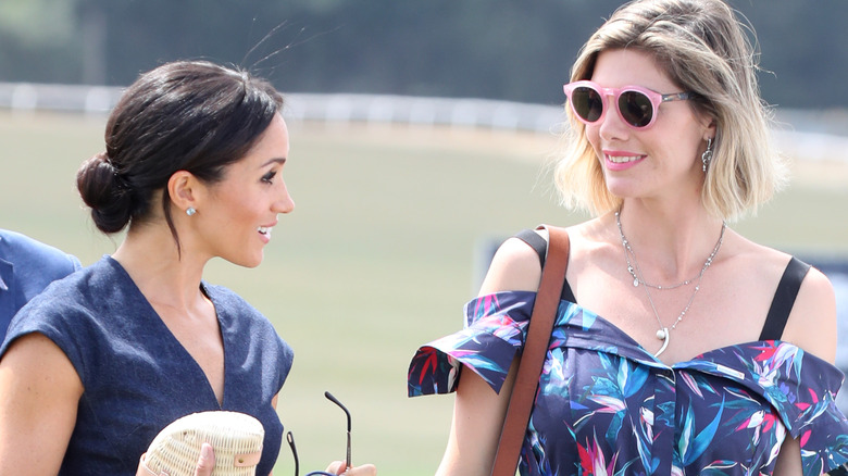 Meghan Markle talking to Delfina Blaquier at polo match