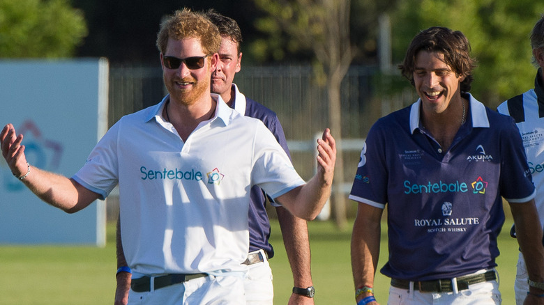 Prince Harry and Nacho Figueras laughing after polo match