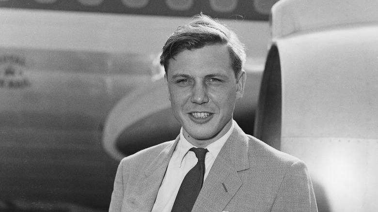 Young David Attenborough smiling 