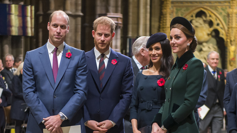 Prince William, Prince Harry, Meghan Markle, and Kate Middleton posing