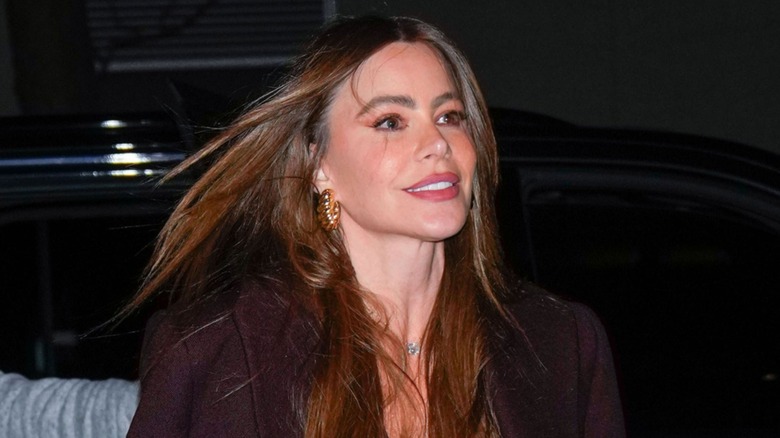 Sofia Vergara walking outside and smiling