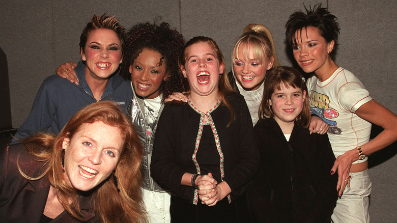 Spice Girls posing with Beatrice, Eugenie, and Fergie