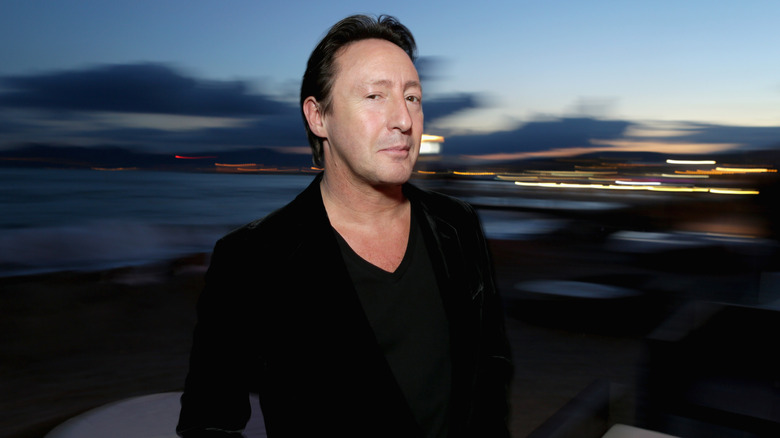 Julian Lennon in a black tshirt and blazer