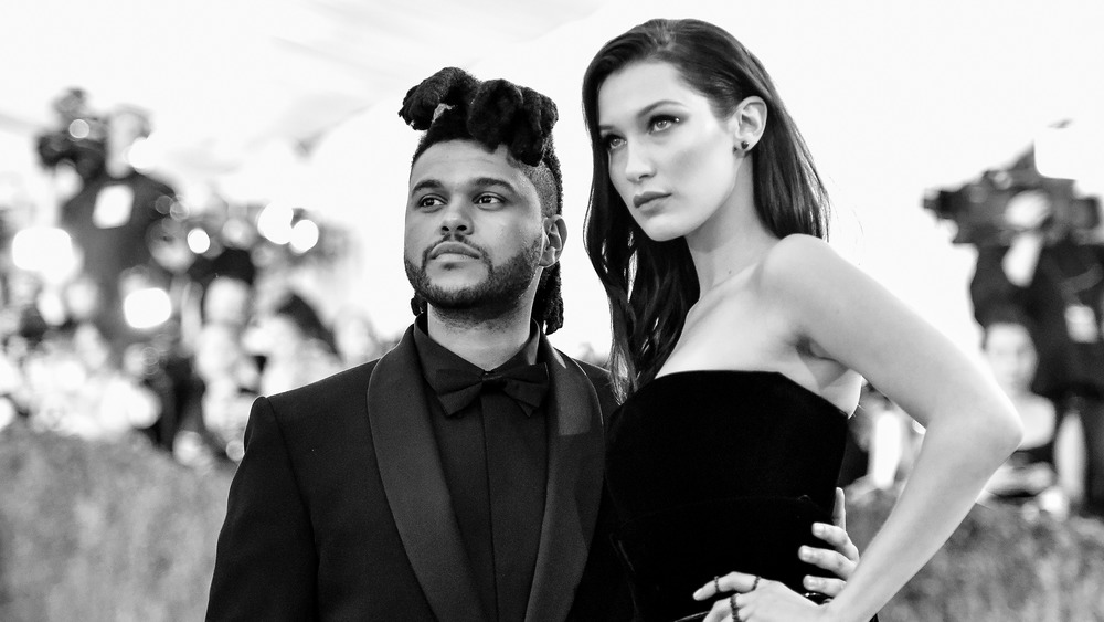 The Weeknd posing with Hadid