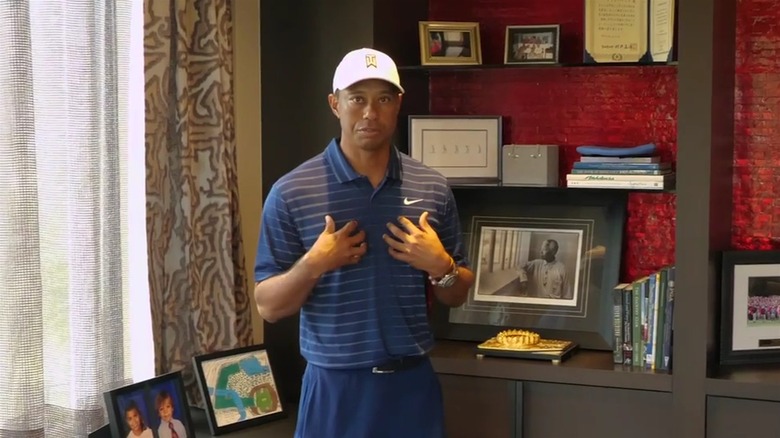 Tiger Woods in his office