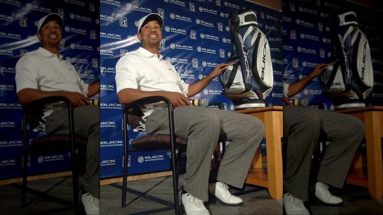 Tiger Woods sitting in a chair