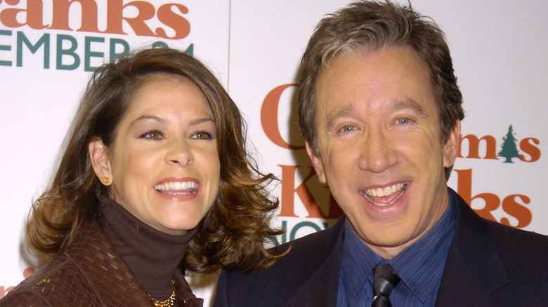 Jane Hajduk and Tim Allen smiling