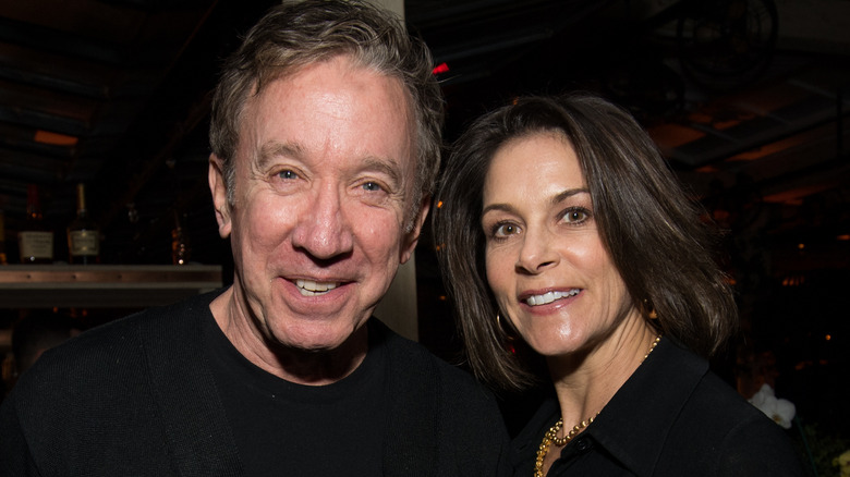 Tim Allen and Jane Hajduk smiling