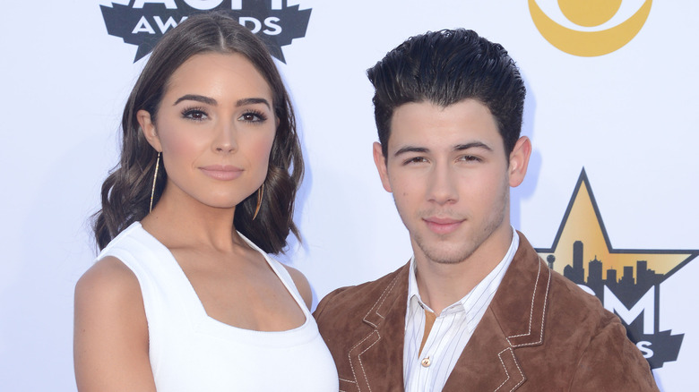 Olivia Culpo and Nick Jonas attend an event 