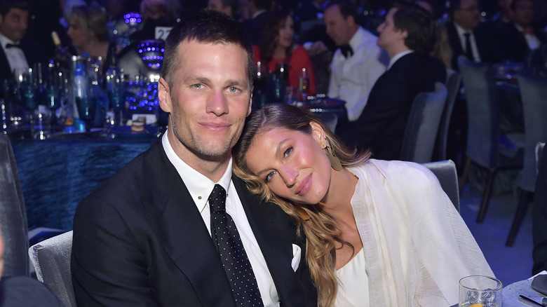 Tom Brady and Gisele Bündchen attending an event