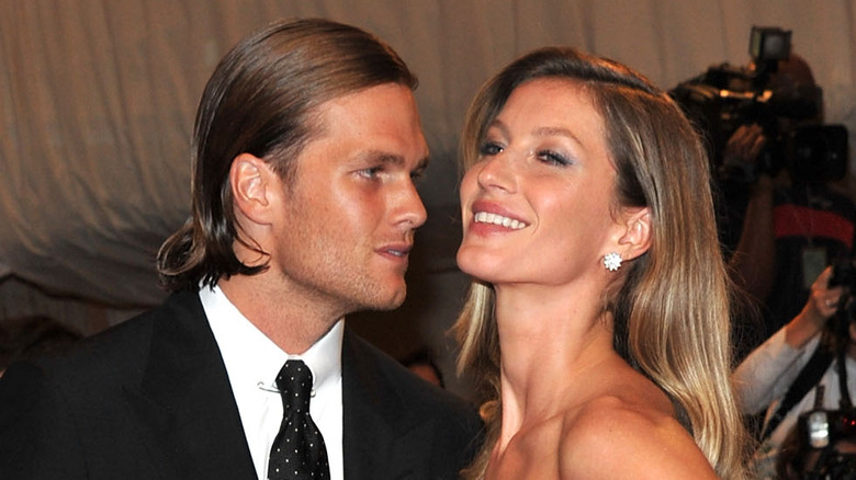 Tom Brady and Gisele Bündchen attending an event