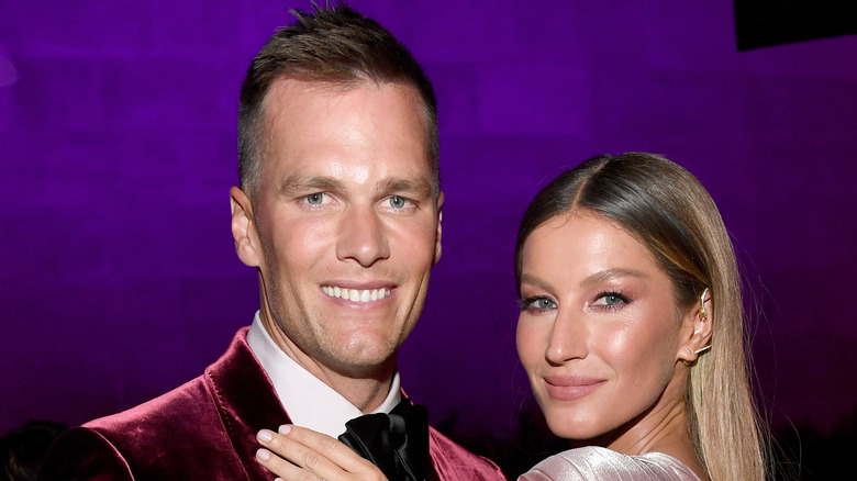 Tom Brady and Gisele Bündchen attending an event