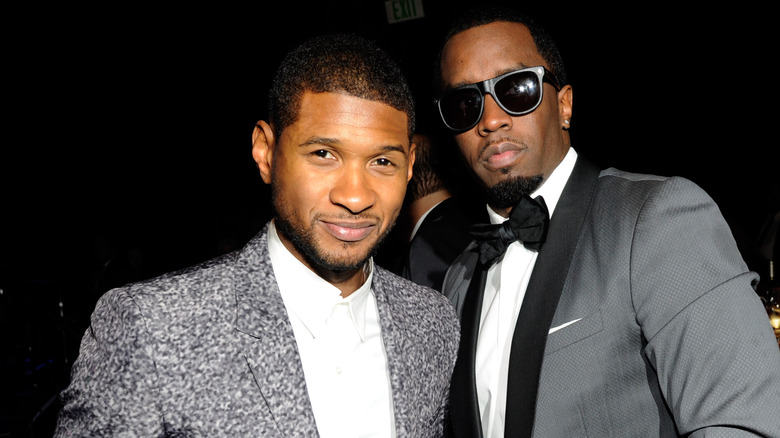  Diddy and Usher posing for photos