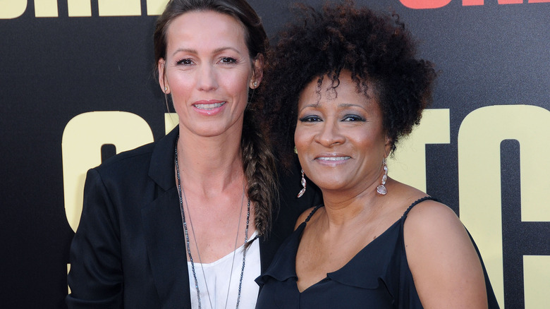 Alex and Wanda Sykes attending an event