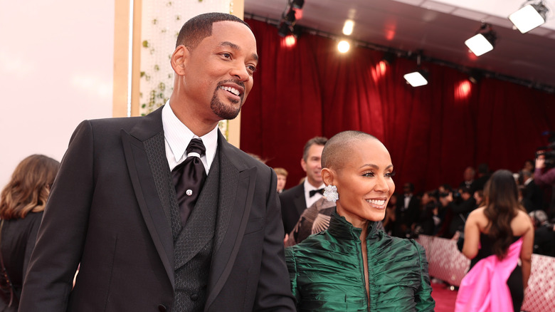 Will Smith and Jada Pinkett Smith smiling