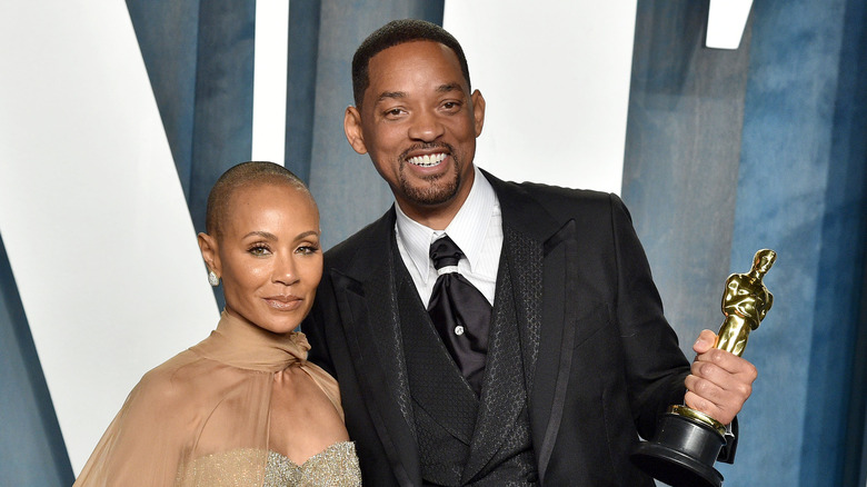 Will Smith and Jada Pinkett Smith posing