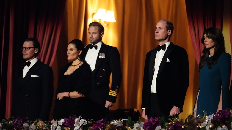 Prince Daniel, Crown Princess Victoria, Prince William, and Kate Middleton stand during Royal Variety Performance