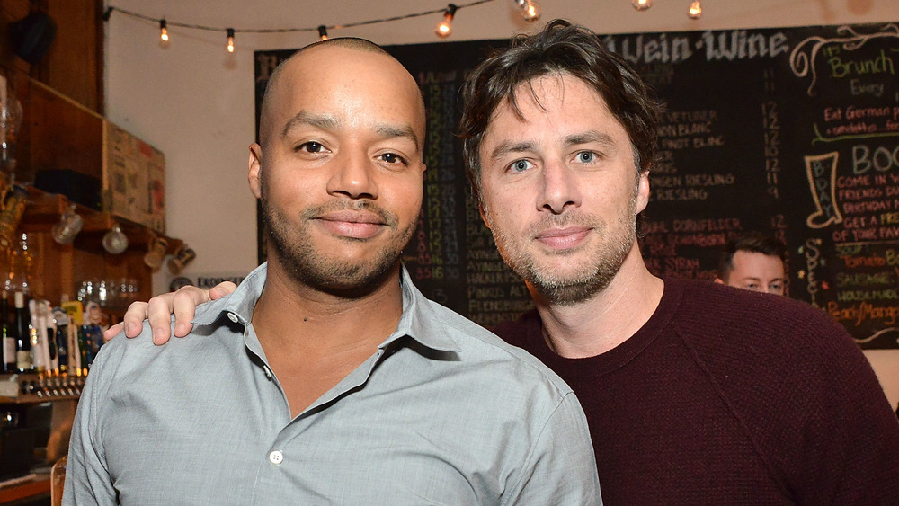 Donald Faison and Zach Braff posing together 