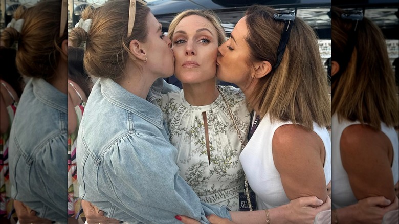 Princess Beatrice kissing Zara Tindall on cheek