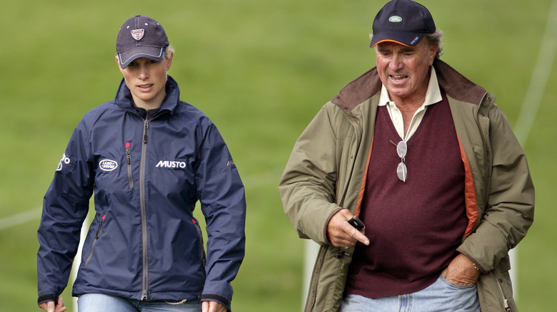 Zara Tindall and Captain Mark Phillips talking