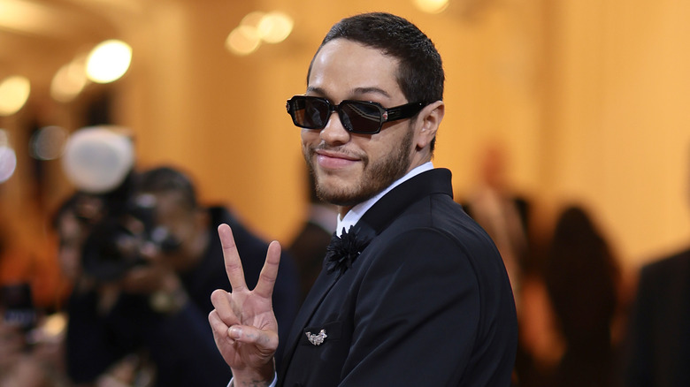 Pete Davidson giving peace sign at the Met Gala 