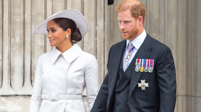 Meghan Markle and Prince Harry walking out of Thanksgiving Mass at the Platinum Jubilee