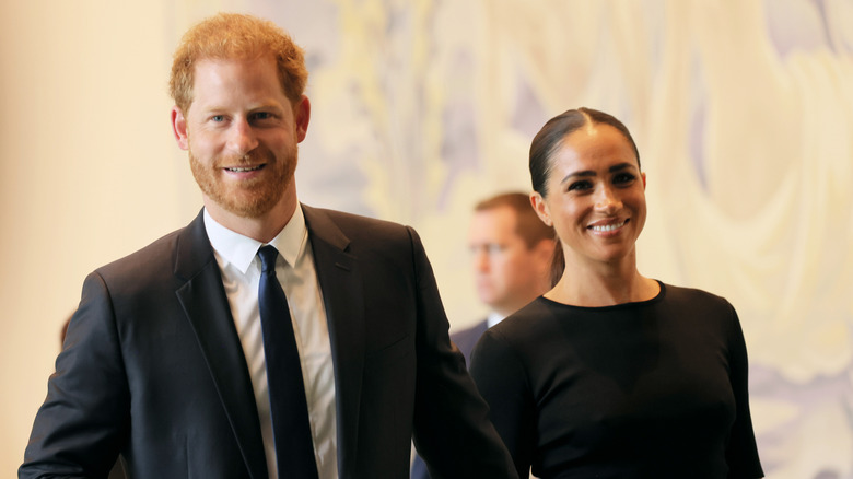 Prince Harry and Meghan Markle smile after U.N. speech 2022