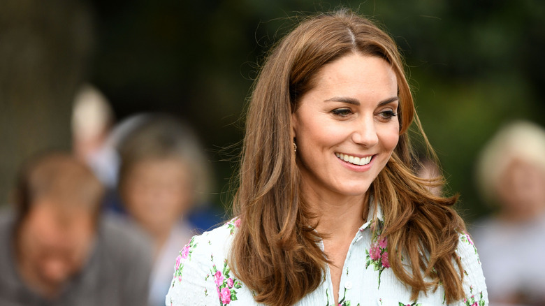 Kate Middleton smiling and looking to the side