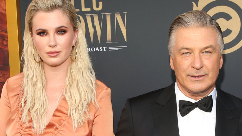 Ireland and Alec Baldwin holding hands on the red carpet