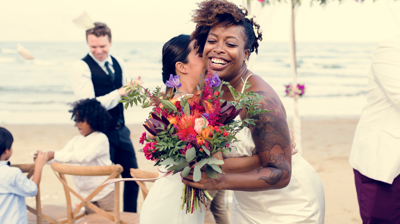 bride hugging guest