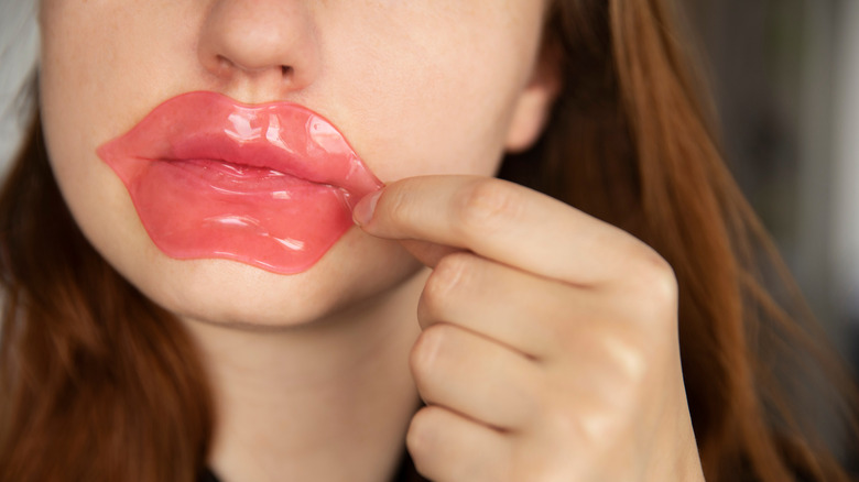 woman using a lip mask