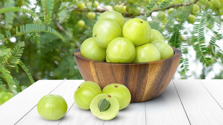 bowl of Indian gooseberry fruits