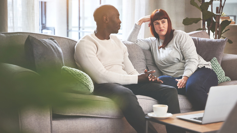 Couple sitting on couch