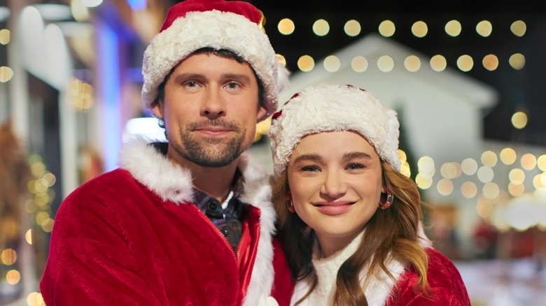 Benjamin Hollingsworth and Hunter King in a promotional image for "The Santa Summit"