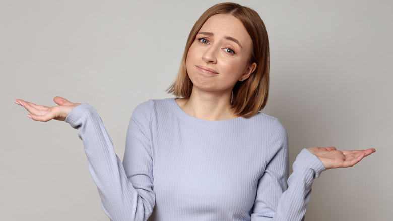 Woman in uncertain pose