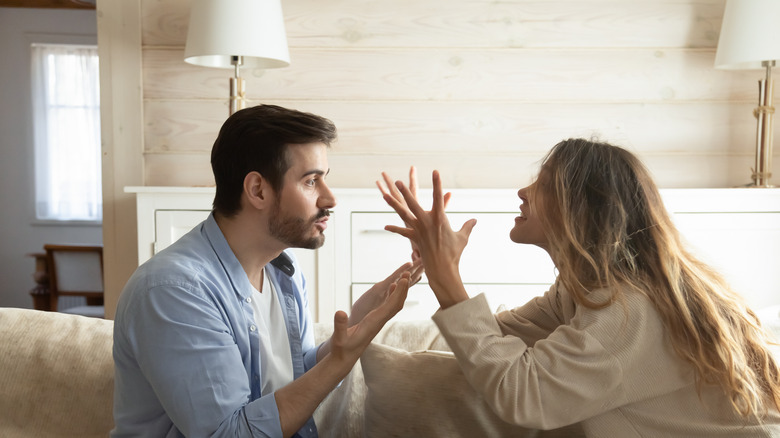 man and woman couple arguing