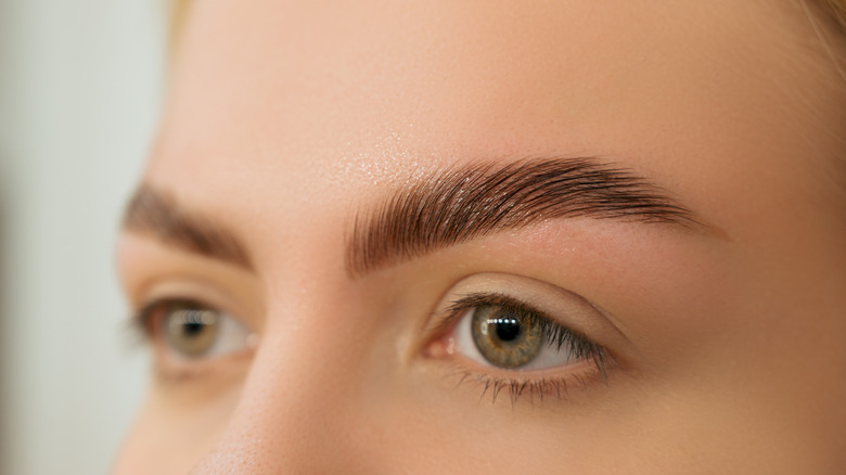 Close up of a woman with green eyes