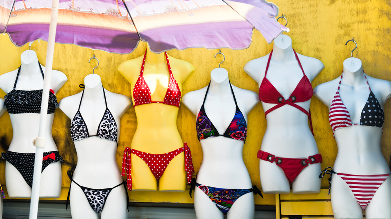 Bathing suits on mannequins in a shop