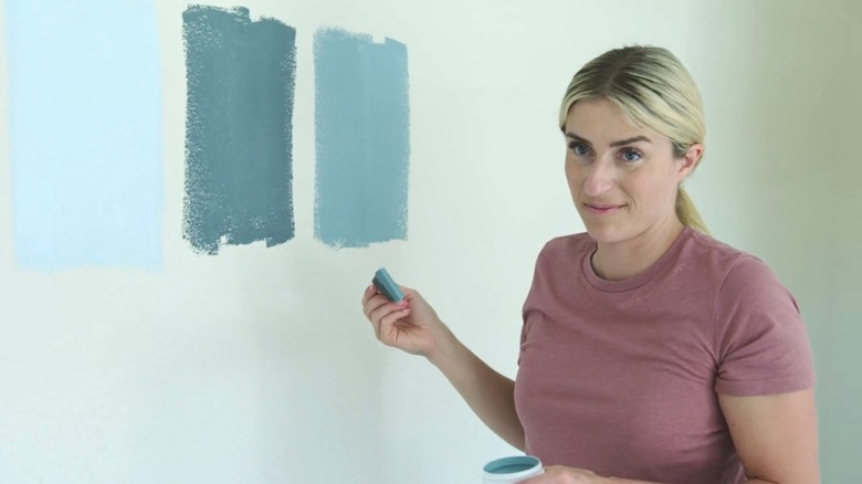 Jasmine Roth sampling paint colors in "Help! I Wrecked My House"