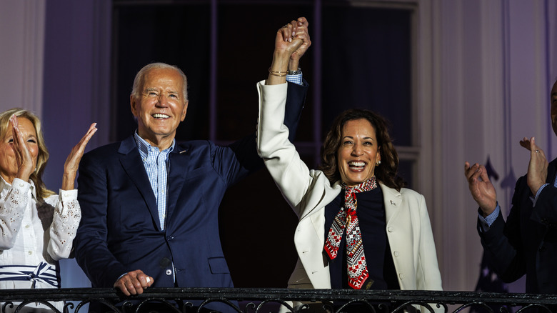 Joe Biden and Kamala Harris waving